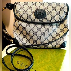 Authentic Gucci monogram crossbody w/ gold detail bag